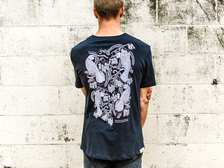 Back of Men's Waka Huia navy T-shirt with design by Hannah Jensen. Organic cotton fair trade tee, hand screen printed by The Paper Rain Project in Marlborough New Zealand