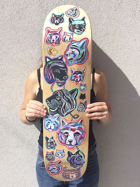 'Study of a Tiger' hand-painted by Mica Still acrylic and ink on maple skateboard.