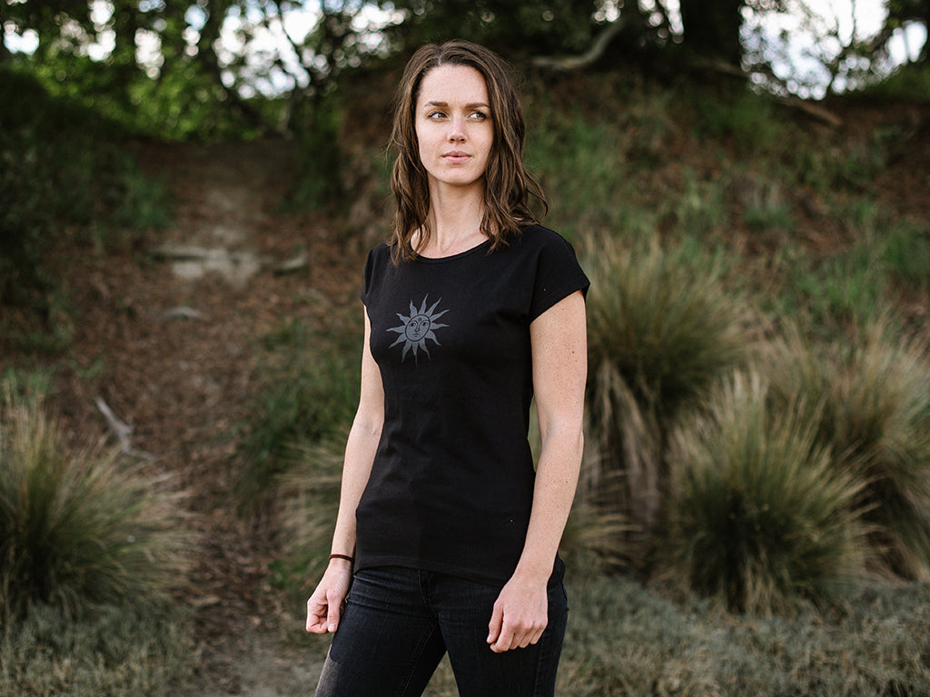 Front of The Time Is Now #2 Women's Organic Cotton T-Shirt in Black by Woo Woo. Printed in New Zealand by The Paper Rain Project